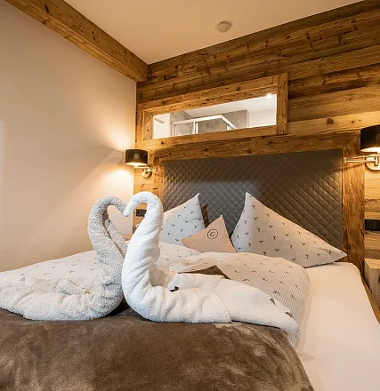 grittlmuehle-brixentalerstrasse-17-brixen-07-2023-appartement-gaisberg-schlafzimmer-1